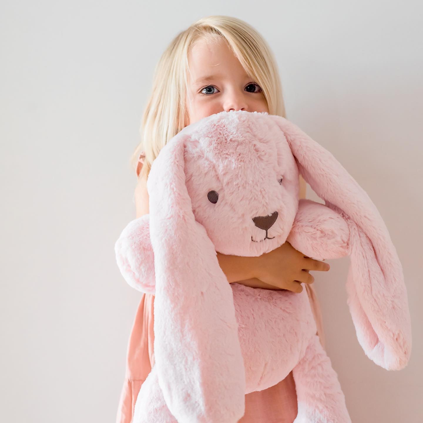 Child with Large Pink Bunny